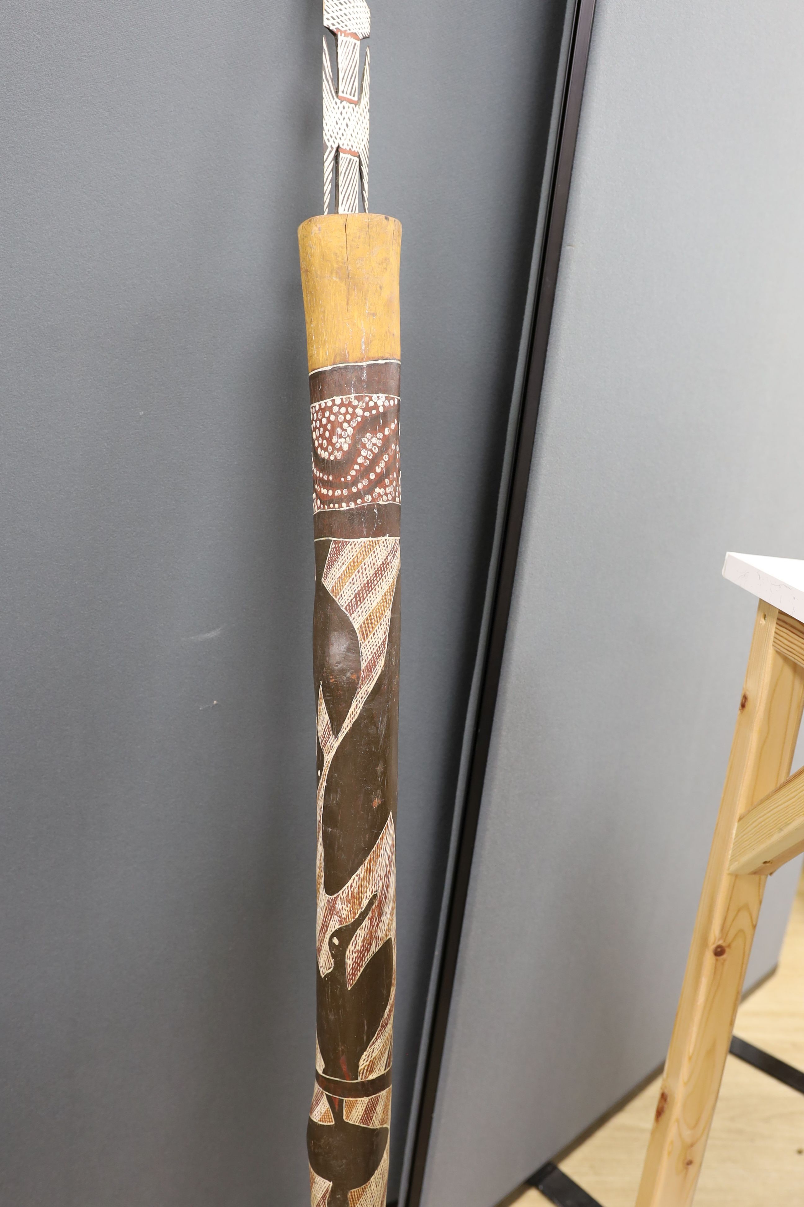 A 20th century Australian aboriginal spear and holder and 2 boomerangs., Spear 142 cms long.